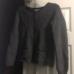 Leather trimmed cardigan.